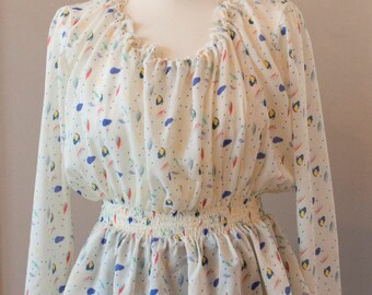 Romantic blouse with Smok and peplum long in white/cream