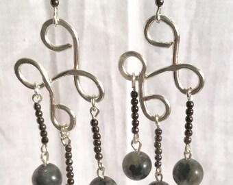 Handcrafted Labradorite chandelier earrings with silver wire, hammered to create a flattened appearance.