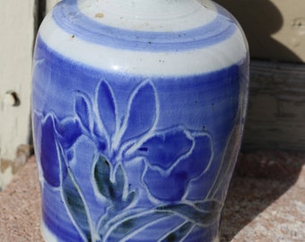 Flower vase with blue flowers