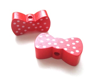 Wooden bow - red with white dots bead