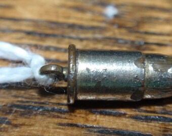 Miniature bullet charm