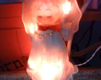 Vintage kewpie doll tree topper