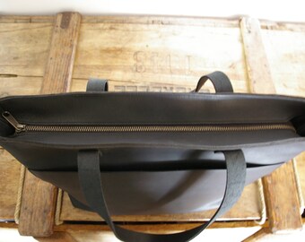 Add zipper to a tote bag of the shop. Handmade