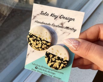Large round stud earings black and white with gold leafs