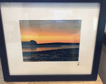 Sunset over Penrhyn Bay Beach