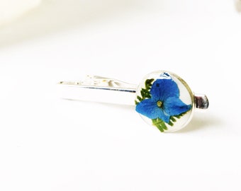 Pressed flower tie clip , blue hydrangea with ferns on white epixy clay, filled with resin