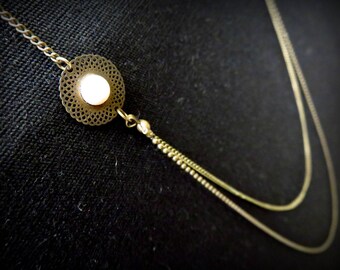 Art deco asymmetrical brass and ivory cabochon necklace two levels