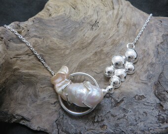 Sterling silver with large baroque Pearl called "Flameball" necklace