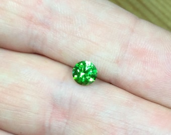 Demantoid 0,71 ct., D-5,44mm.