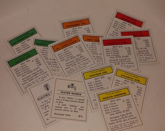 monopoly property cards deeds lot paper 14 old colorful game pieces altered art scrapbook supplies