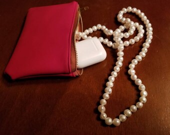 Red pouch with vintage lining