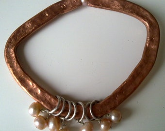 PRIMITIVE LOOKING hammered copper set.