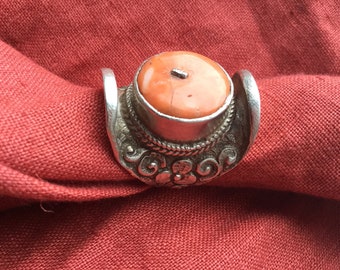 Antique Tibetan silver saddle ring with blood coral
