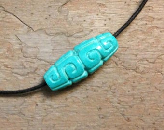 Hand Carved Turquoise Bead.