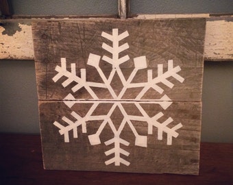 Reclaimed wood snowflake, perfect for holiday decorating!