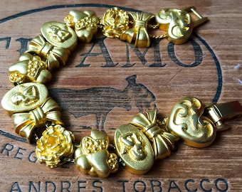 Beautiful Vintage Charm Bracelet with a rich Gold Plating