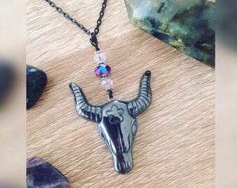 Carved hematite bull head pendant necklace