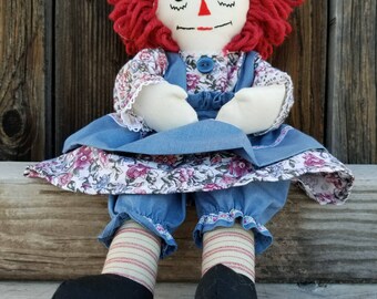 Handmade Raggedy Ann Doll with blue apron.
