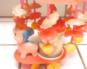 Wind Up Toy Carousel with Cellioud Elephant