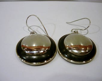 Earrings in silver and wood.