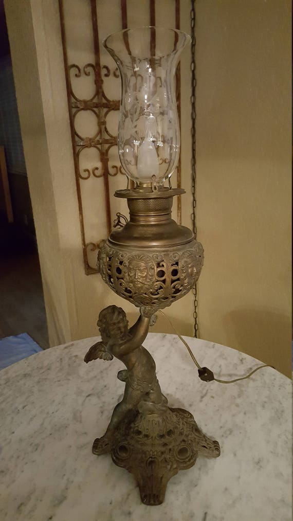 Items similar to angel lamp angel oil lamp lantern vintage angel on Etsy