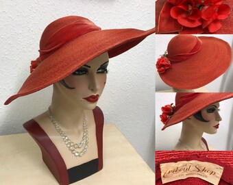 1940's orange straw wide brim tilt hat with rose detail