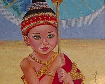 Little girl from Laos on her most beautiful, all in Traditional Costume