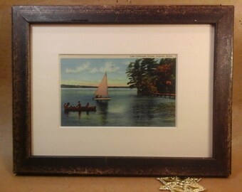 Framed Vintage tinted Linen Postcard, Sailboat & Canoe on Maine Lake