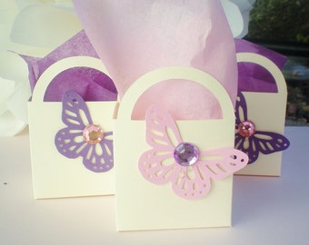 16 butterfly party favors, pink, purple cream tissue included