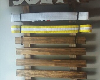 Martial arts display rack, karate belt display rack, organization
