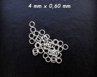 Silver metal (12) 4 mm jump rings