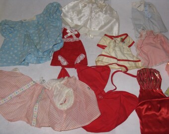 Lot of vintage doll clothes varied sizes 17 pieces