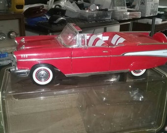 1957 diecast 1:18 scale red Chevrolet Bel Air with box.
