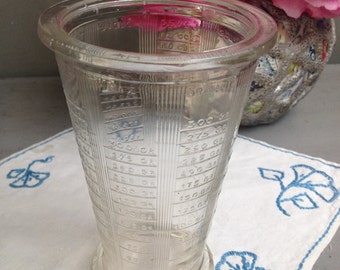 Old glass graduated measuring Mougin