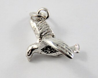 A Seagull Soaring Through the Air Sterling Silver Charm or Pendant.