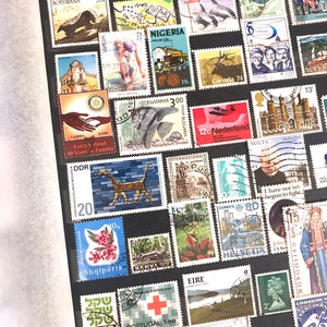 Large A4 Green Stamp album with more than 700 used postage stamps from 97 countries - collection philately paper - crafts, collecting, art