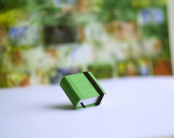 Hand-bound miniature sketchbook kiwi-green.
