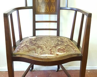 An Arts & Crafts Arm Chair by J.S. Henry