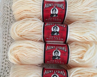 4 skeins rug yarn Aunt Lydia’s 140 heavy rug yarn Total 560 yards) #558 original cream color craft supplies