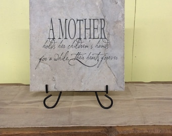 A Mother Holds Her Children's Hands Laser Engraved Tile 13" x 13"