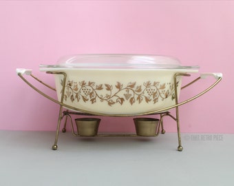 Pyrex 'Golden Casserole' #045 oval casserole dish with lid and warmer (c. 1959)