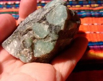 Emerald green Beryl in calcite mica matrix raw specimen
