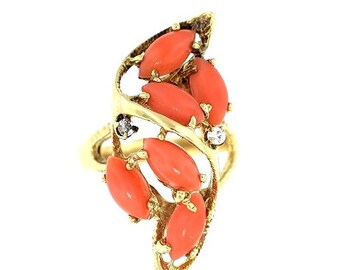 A 14K yellow gold Coral And Diamonds Ring