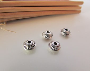 10 Pearl 7 x 4 mm antiqued silver - 1 mm hole - 273.34