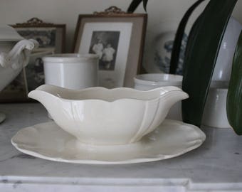 Antique gravy boat in earthenware of Sarreguemines white breakage
