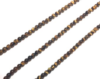 Tigers Eye Strands. Beads. Tigers Eye. Small and Large Beads.
