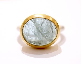 Silver ring with 22k gold version and Aquamarine Cabochon