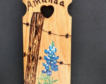 Texas blue bonnet on wood