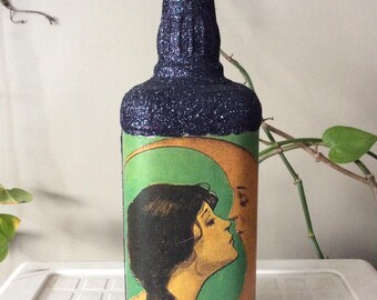 Girl and moon whiskey bottle