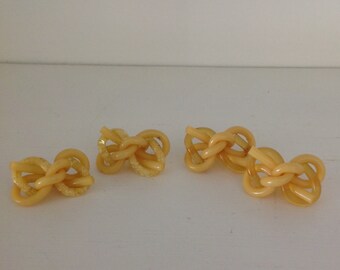 Extruded vintage celluloid buttons